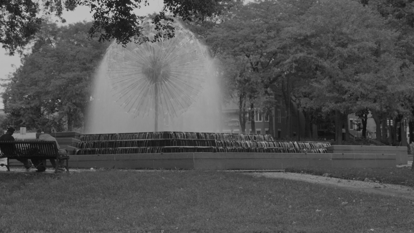 stylized, B&W photo of DUNWOODY COLLEGE OF TECHNOLOGY, LORING PARK DANDELION FOUNTAIN ENCLOSURE